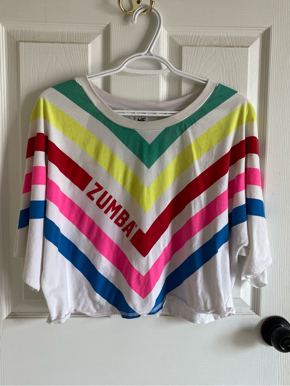 Zumba Fitness Cropped Tee in White with Multi-Color Chevron Stripes